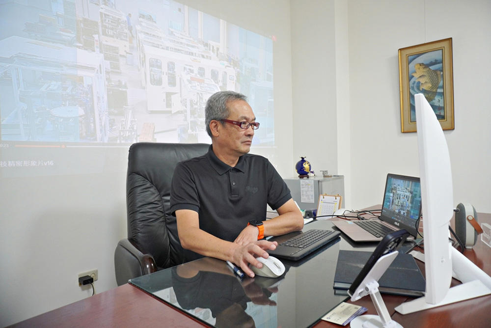 總經理周東回